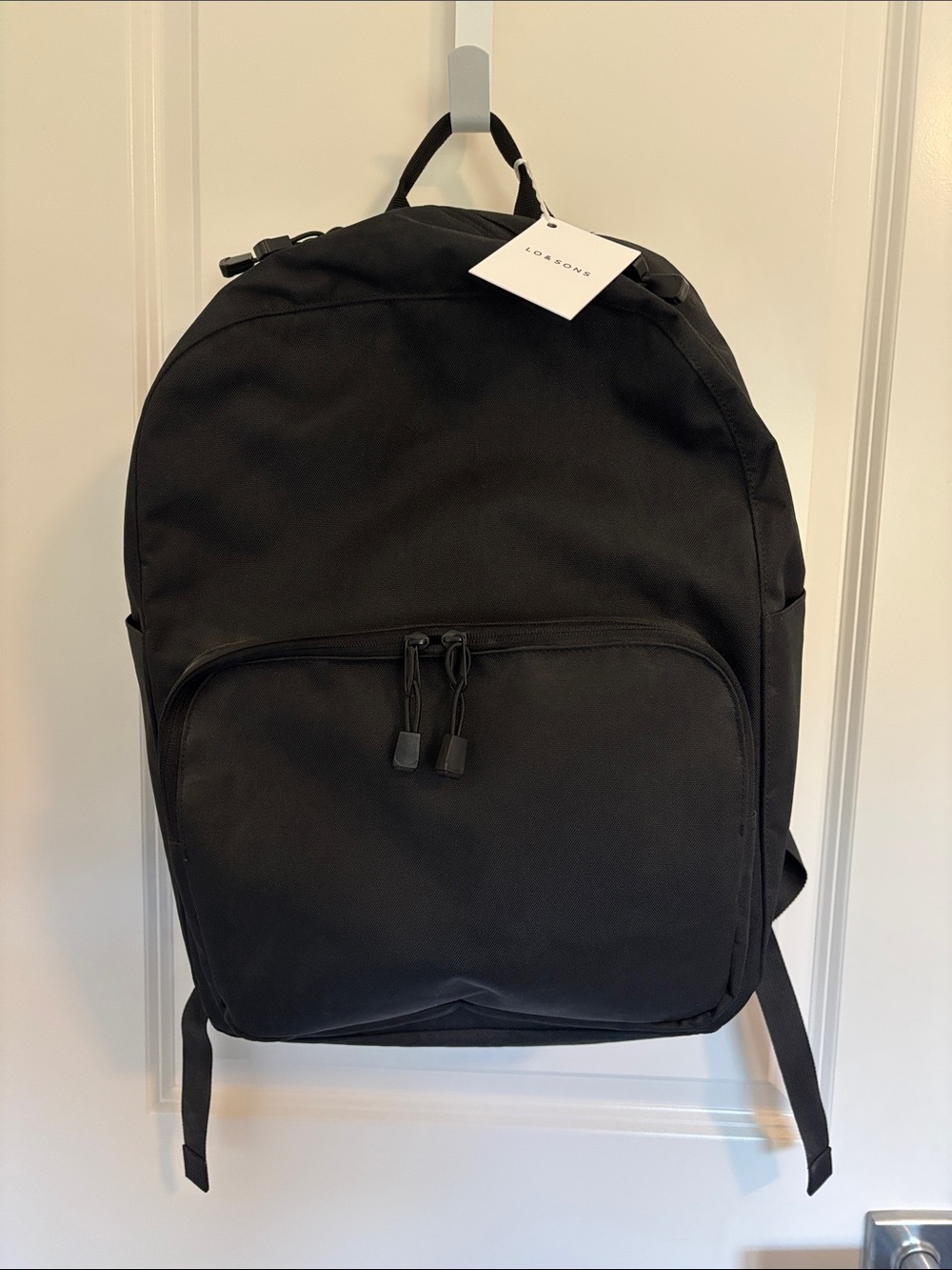 Lo & Sons Black Backpack with Front Zip Pocket